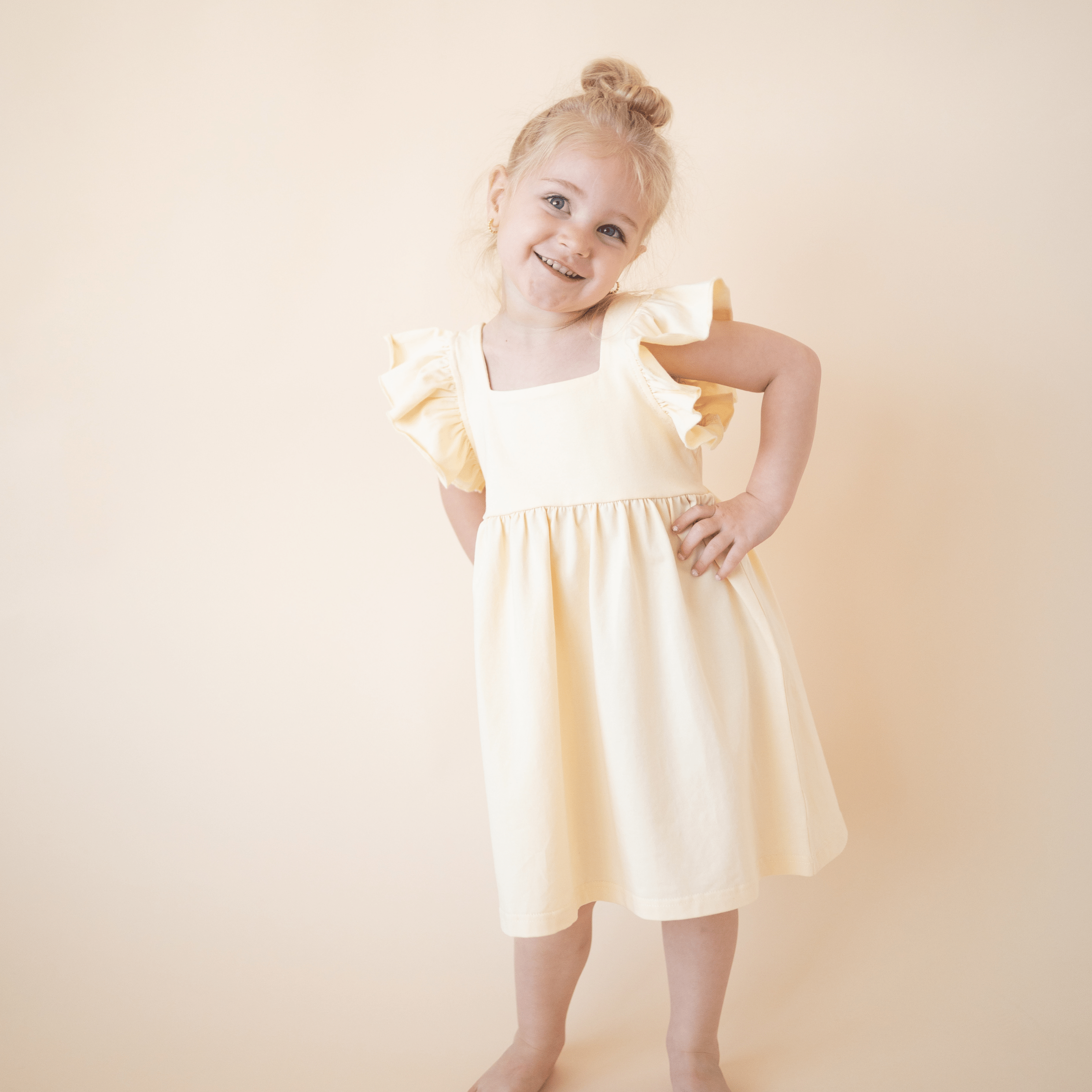 white christmas dresses Organic Cotton Flutter Dress – Lemonade Yellow 3-6M by Bugandbeankids