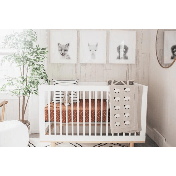 baby nursery with mebie baby rust mudcloth crib sheet
