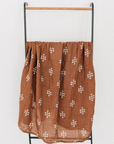 hanging mebie baby cotton muslin swaddle, chestnut textiles