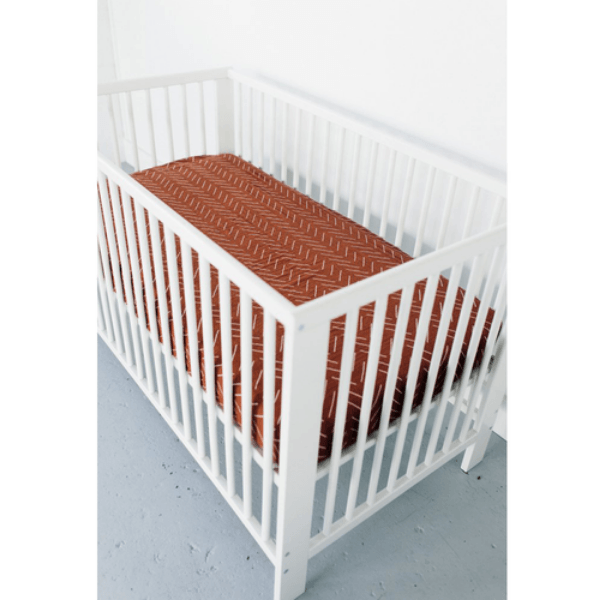 cotton muslin crib sheet, rust mud cloth bug + bean kids