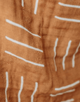 mustard mudcloth crib sheet detail